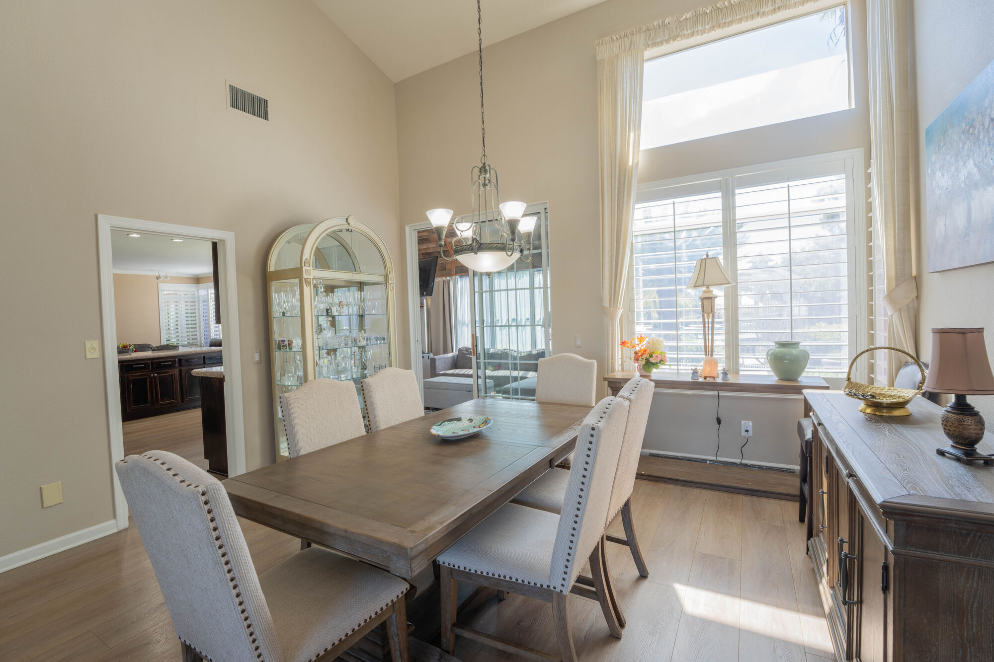 Dining room and entryway staged for a real estate listing