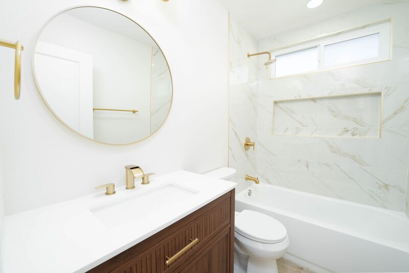 Marble bathroom with gold fixtures